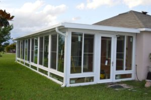 Picture of the exterior of a recently installed sunroom addition.