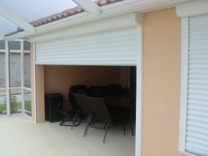 Residential property with roll-down shutters.