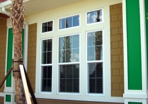 Windows installed on property with green accent walls.