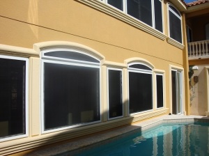 Residential property with Crimsafe security window screens installed. 